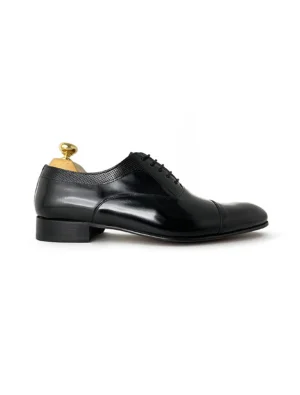 Chaussures Richelieu en cuir bleu marine à détails – Camilliano